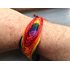 Vaxat armband regnbågsfärger